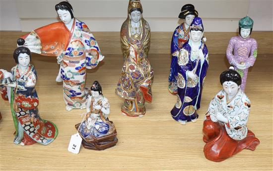 Nine Japanese porcelain / pottery figures tallest 37cm